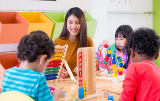 STEAM Fair & Open House. Teacher with kids